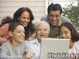 family around laptop